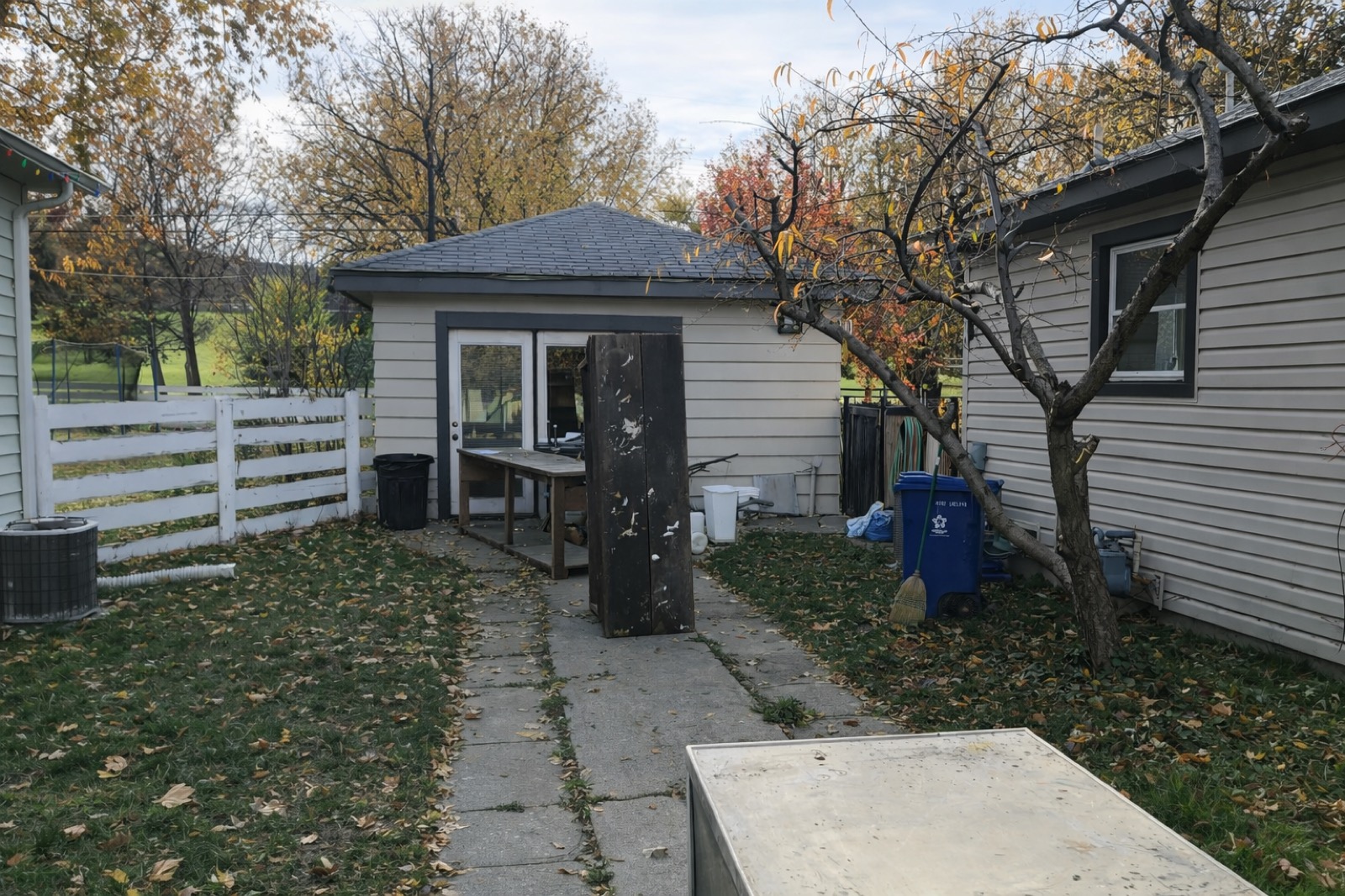 The original 1950s detached garage before demolition.